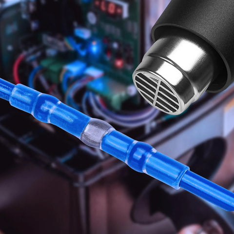 Blue solder-seal butt connector on blue automotive wire for electrical splice.