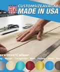 Hands measuring fabric for Built Tough Waterproof Shade Sail in beige, custom sizes, Made in USA, color options shown.