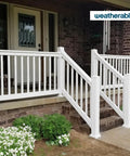 Premium White Vinyl Porch And Deck Railing Kit For Balconies Patios And Outdoors installed on steps with flowers nearby.