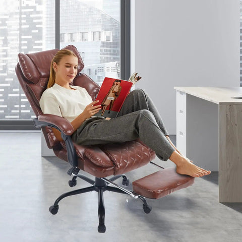 Person relaxing on Big Tall Reclining Executive Office Chair With Footrest, Heavy Duty Ergonomic Desk Chair With Lumbar Support