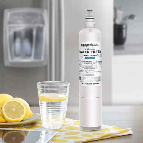 Image of LG LT600P Refrigerator Water Filter Replacement For Advanced Filtration With Leak-Proof Fit And Easy Install on a kitchen counter beside lemons and a glass of water with a refrigerator in the background.