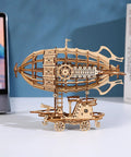 Epic 3D Wooden Airship Puzzle Kit For Adults, DIY miniature ship on desk with laptop backdrop