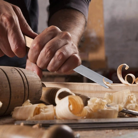 Carving wood using Eight Piece Wood Lathe Tools Set For Turning Chisels With Skews Gouges And Round Nose Pro Grade Lathe Chisels