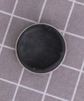 Rubber Bathtub Stopper 2pcs for Bathroom and Laundry Drain Use, showing the smooth black rubber base, flat design for effective sealing.