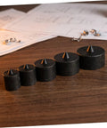 Heavy Duty Metal Shaft Protector Kit With Conical End Guard For Grip O Matic Pullers and Axle Protection, stacked sizes on wood surface.