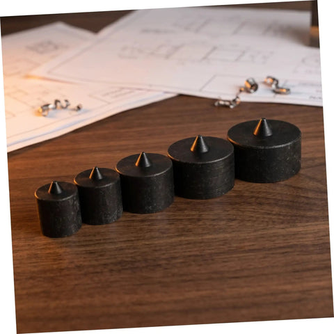 Heavy Duty Metal Shaft Protector Kit With Conical End Guard For Grip O Matic Pullers and Axle Protection, stacked sizes on wood surface.