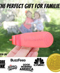 Close-up of red Car Seat Buckle Release Tool For Easy Unbuckling On 5 Point Harnesses, Thumb Pain Relief And Nail Saver, outdoors