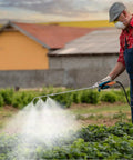 Heavy Duty Sprayer Wand With Three Nozzles For Flexible Garden And Lawn Care in use spraying plants in a garden