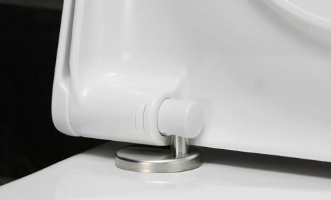 Close-up of the smooth soft close hinge on the Slick Starck 3 White Toilet Seat with stainless steel mounting.