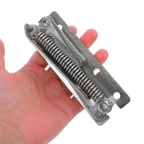 Close-up of Heavy Duty 90 Degree Folding Scissor Spring Hinge For Cabinet Doors And Sofas In Steel Construction held in hand