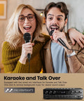 Couple singing with microphones using Six Channel Home Theater Receiver With 1000W Peak Power, Bluetooth 5.3, USB, FM, Two Mic Inputs, Echo, RCA, Optical And Coaxial Inputs For Karaoke Or Theater Speakers MAMP6