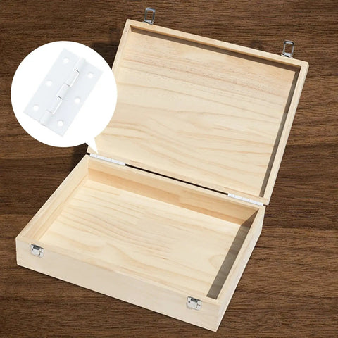 Heavy Duty White Iron Folding Butt Hinges 2.5 Inch With Commercial Grade Zero Play Action For Chicken Coops And Garden Gates Rust Tough Smooth Swinging hardware on a wooden box.