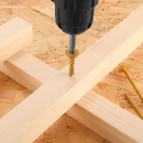 Beefy Heavy Duty Structural Wood Deck Screws Number Fourteen By Two Inches with flat head driven into wood.