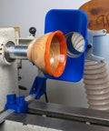 Kickass Adjustable Dust Collection Rig For Split Bed Wood Lathes With Tight Four Inch Hose Hookup and Three Way Flex Brackets in use on lathe.