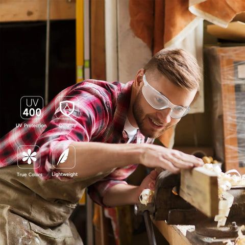 Clear ANSI Z87.1 Safety Glasses For Men With Polycarbonate Lenses, Scratch And Impact Resistant, Wind And Dust Protection, Comfy Fit, Available In Clear Or Smoke Tint For Everyday Outdoor Use. Man wearing clear ANSI Z87.1 safety glasses, lightweight polycarbonate lenses for woodworking.