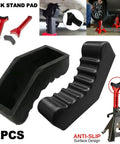 Two black rubber Amazon jack stand pads with ribbed curved surface for anti-slip automotive lifting (2 pcs).