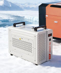Solid Industrial Water Chiller With 5460 BtuH Cooling Output And Built In Compressor For CO2 Laser Engines Up To 150W Plus CNC Coolant Systems in snowy landscape.