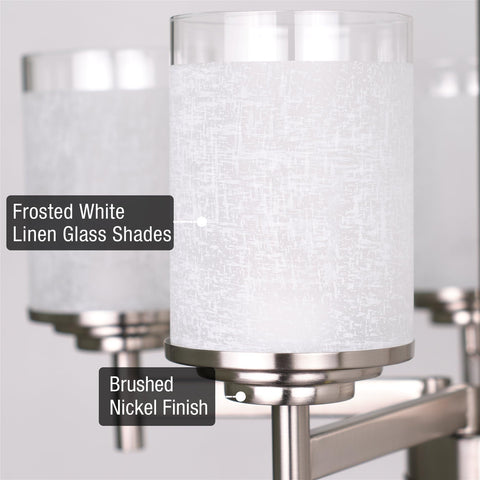 Close-up of frosted white linen glass shades and brushed nickel finish on modern farmhouse 19 inch 5 light chandelier fixture.