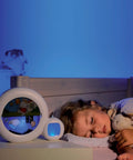 Moon 5-In-1 Day Night Educational Alarm Clock For Babies 0-3 Years with soothing night light by sleeping child