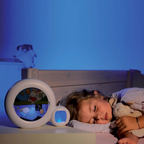 Moon 5-In-1 Day Night Educational Alarm Clock For Babies 0-3 Years with soothing night light by sleeping child