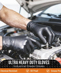 Nitrile gloves, black diamond-textured, close-up of mechanic working on car engine