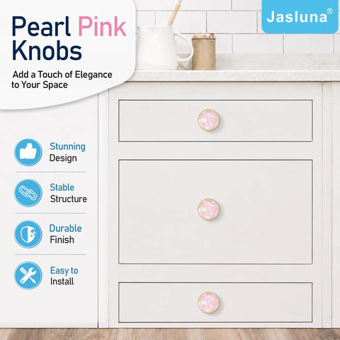 Six Pack Pink Shell Cabinet Knobs Set, 1-1/4 Inch Round Dresser Pulls In Zinc Alloy With Brushed Brass Finish on white drawers.