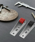 Heavy Duty Sliding Barn Door Rollers Built Tough For Large Widths Cold Rolled Steel Hardware with red and black rollers.