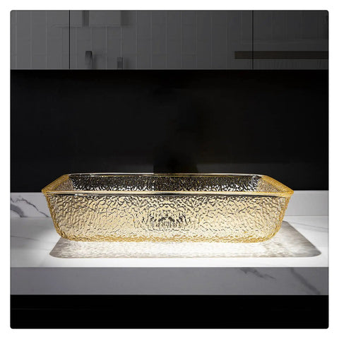 Go Big Or Go Home Bathroom Remodel With This Premium Crystal Glass Vessel Basin Featuring Tough Rectangular Design Heavy Duty Construction Smooth Pop Up Drain And Shatter Proof Build That Seriously Slaps - Gold rectangular vessel sink on countertop.