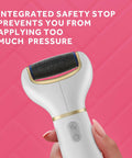 Electric Callus Remover Foot File With Diamond Crystals, showing safety stop feature, held in hand on pink background