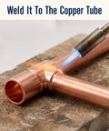 Welding a Premium Quarter Inch Straight Copper Pipe Fitting and Heavy Duty Coupling, visible flame for plumbing projects.