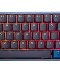 Kickass Sixty Percent Compact Mechanical Keyboard With Hot Swappable Top Tier Keys And Double Shot PBT Keycaps Dual Layer Sound Dampened Construction Plus Custom RGB Lighting For Daily Typing And Gaming Vibes That Totally Slam, top view, RGB lit keys, blue and yellow keycaps.