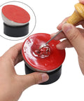 Red Sealing Ball Tool For Jewelry Making And Rings Engraving And Setting And Manufacturing Accessories Durable Crafting Gear For DIYers Makers Perfect For Handcrafted Jewelry Projects. Red wax tool holding a ring for engraving.