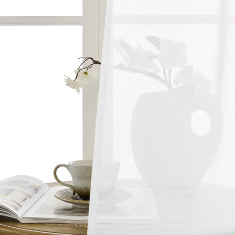 Airy Sheer Door Curtain Panel 25 By 72 Inches White Linen Look Voile with Rod Pocket hung near window, dining setup visible