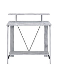 Rock Solid Adjustable Height Standing Computer Desk With Integrated Usb Charging Ports Sleek Metal Ladder Base Gaming Workstation side view with gray finish.