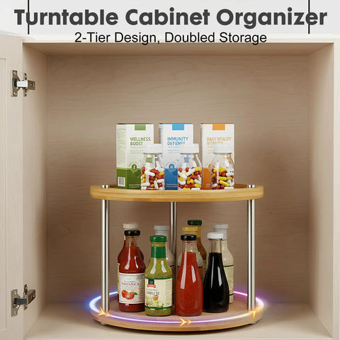 Two Tier Lazy Susan Organizer Revolving Turntable For Cabinets And Countertops 10 Inch Wood Spice Rack in a kitchen cabinet with bottles and jars.