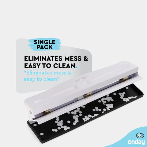 Heavy Duty 3 Hole Punch For Binders with built-in waste tray, white finish, shown open with punched paper holes on display.