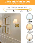 Zero Drilling Hassles Hit Different Vibe Bow Wireless Wall Sconces Set Of 2 Rechargeable Dimmable Led Night Lights With Remote Control mounted on a wall with art frames.