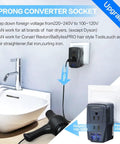 2000W Travel Voltage Converter 220V To 110V Step Down Adapter plugged in with hair dryer, sink nearby