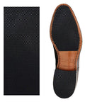 Durable One Sixteenth Inch Thick Rubber Shoe Soling Sheet With Grippy Diamond Pattern For Full Sole Replacement Black Nine By Three Point Five Inches Non Slip Bottom Patch For Sneakers And Boots showing texture and application on shoe sole.