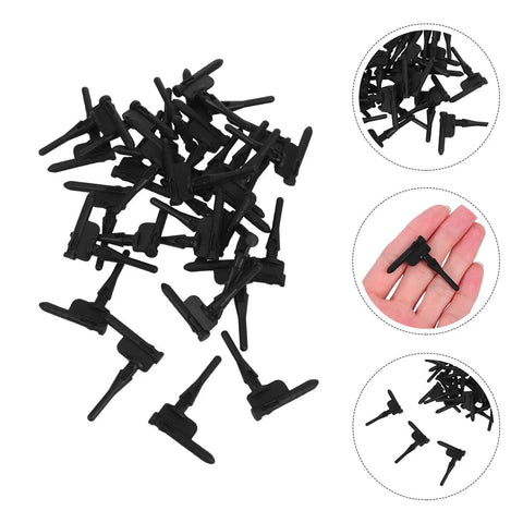 Thirty Piece Black Silicone Cooling Fan Mounting Screws For Pc Computer Case Dead Quiet Vibration Dampening Rubber Sleeves shown stacked.