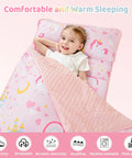 Toddler using Pink Princess Toddler Nap Mat For Preschool Girls With Removable Blanket And Pillow Unicorn Castle Pattern Slumber Bag.