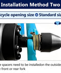 Installation method for Rock Solid M14 E Bike Hub Motor Nut Set showing spacers on a bicycle standard size front fork.