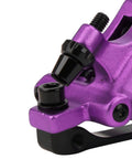 Top Shelf Mechanical Disc Brake Pair Aluminum Alloy Build For Mountain And Road Bikes Beast Mode Stopping Power close-up view of violet caliper.