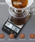Digital Coffee Scale With Timer For Espresso, 1000g By 0.1g Precision, Mini Barista Grade Scale showing weight and timer.