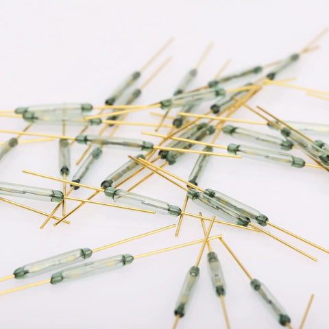 Model MKA-14103 2 By 14mm Reed Normally Open Magnetic Induction Switch Pack of 10 Units scattered on white background
