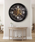 27 Inch Industrial Wall Clock Featuring Real Moving Gears For Living Room Decor on a beige wall above a wooden table.