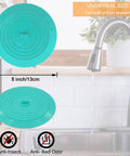 Slick Silicone Tub Stopper Two Pack, 5 Inch Flat Suction Bath Plug With Heavy Grip, turquoise drain cover shown above sink.