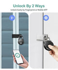 Image showing Smart Biometric Bluetooth Padlock With App Control And Fingerprint Unlock on door, demonstrating two unlock methods.