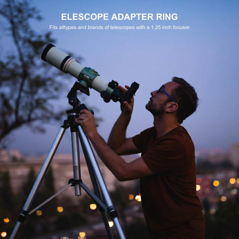 Man using a telescope with 1.25 Inch to 0.965 Inch Eyepiece Adapter for 24.5mm to 31.7mm Telescopes, cityscape background
