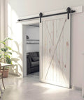 Installed Beefy 8 Foot Sliding Barn Door Hardware Kit Black Track System in modern interior setting